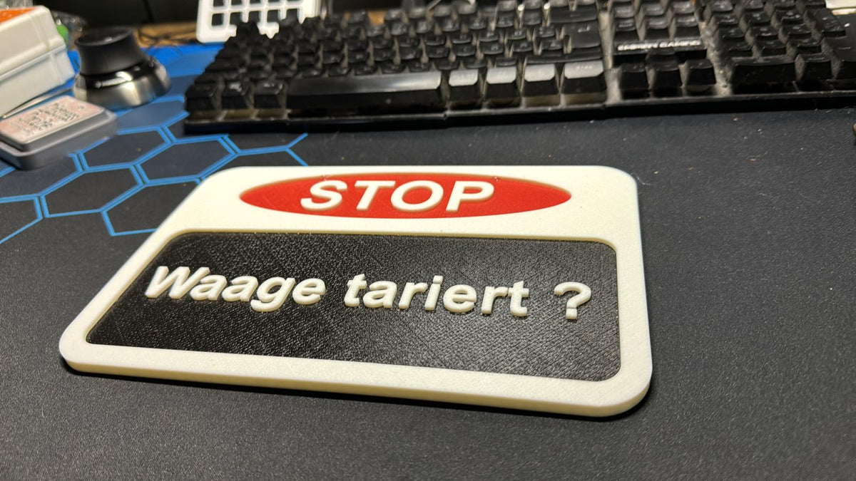 Hinweisschild „Waage tariert?“